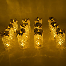 Assortment of gold LED candles with flickering effect, perfect for Christmas and other celebrations.